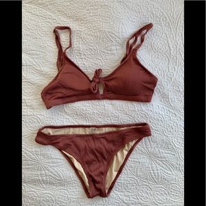 Two piece rust colored bikini tie in the front